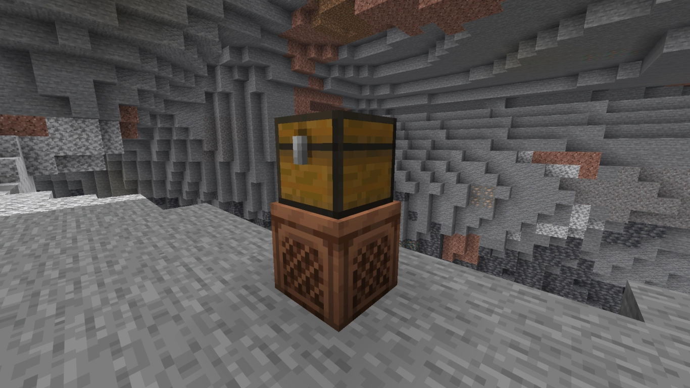 Minecraft 26.4 nova jukebox com um baú por cima como playlist de discos