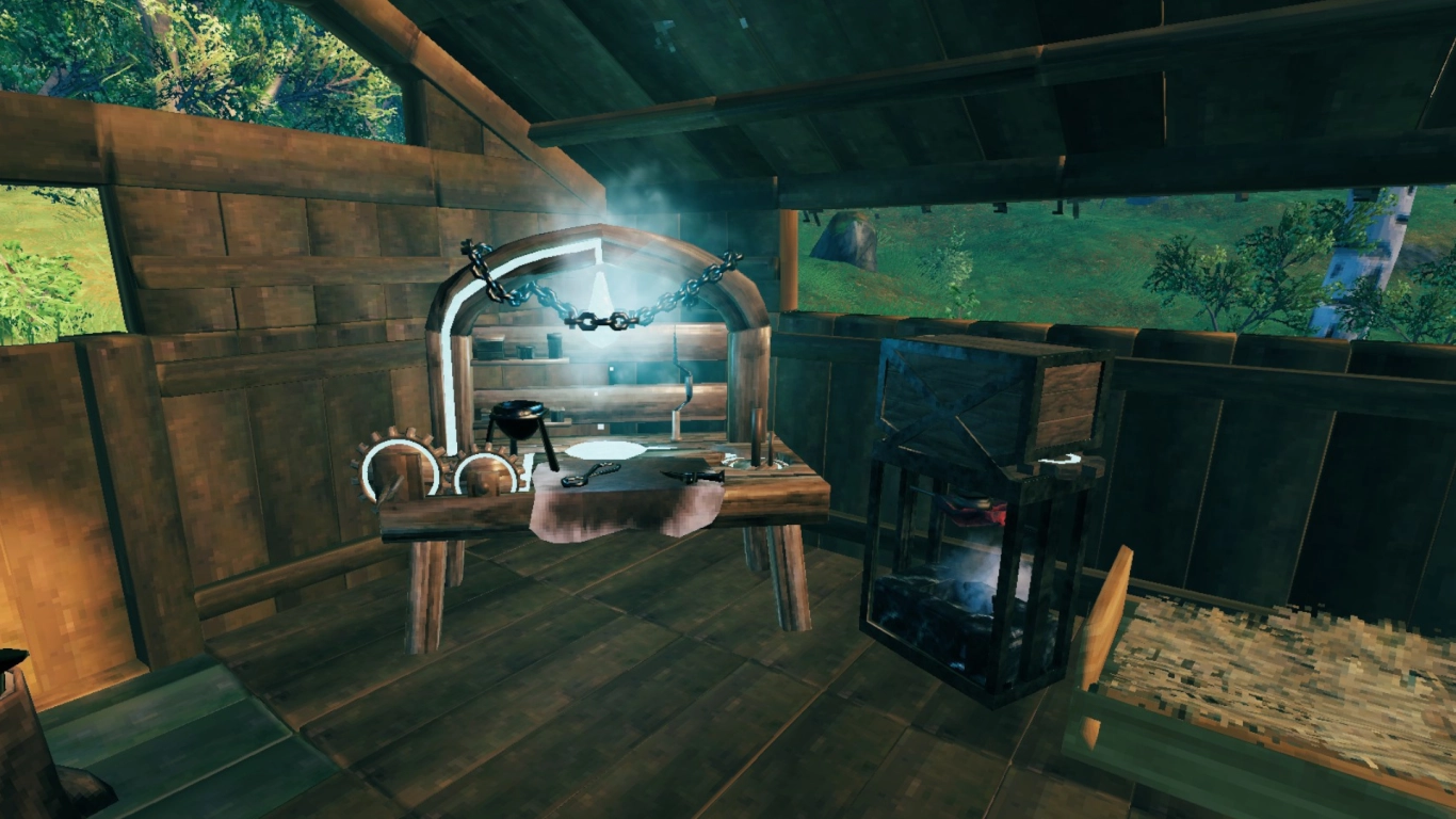 Valheim Handwerkertisch mit Windmühle und Spinnrad im Hintergrund
