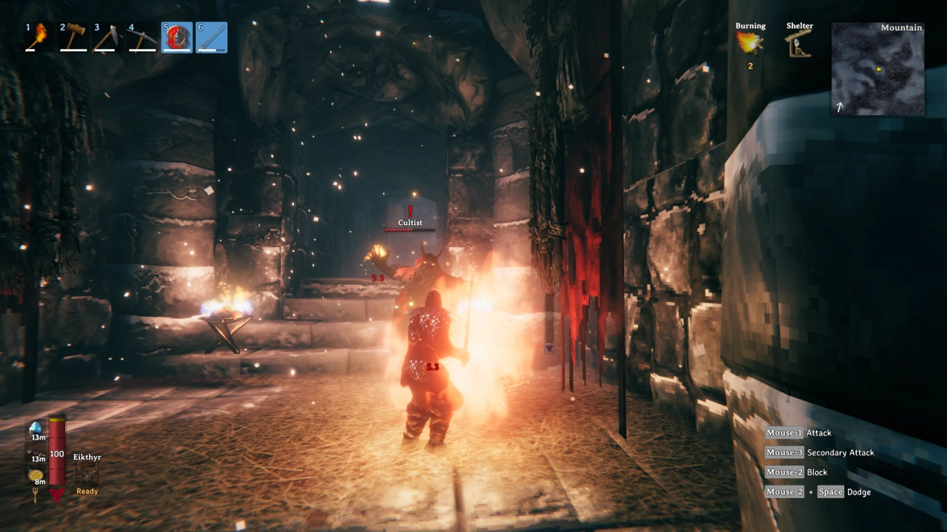 Cultists in red robes casting fire spells in a Frost Cave in Valheim