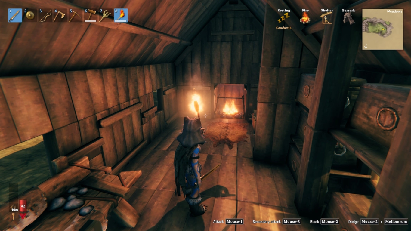 Decoração de casa em Valheim com cama, armazenamento e bancadas para começar